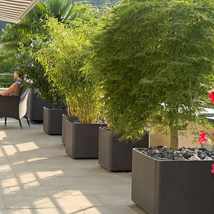 Die schlichten und stilvollen Delta Pflanzentöpfe 45 von Eternit