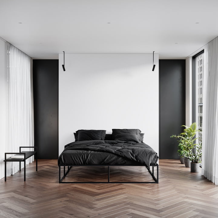 Die Bank von Nichba Design im minimalistischen, schwarz-weißen Schlafzimmer