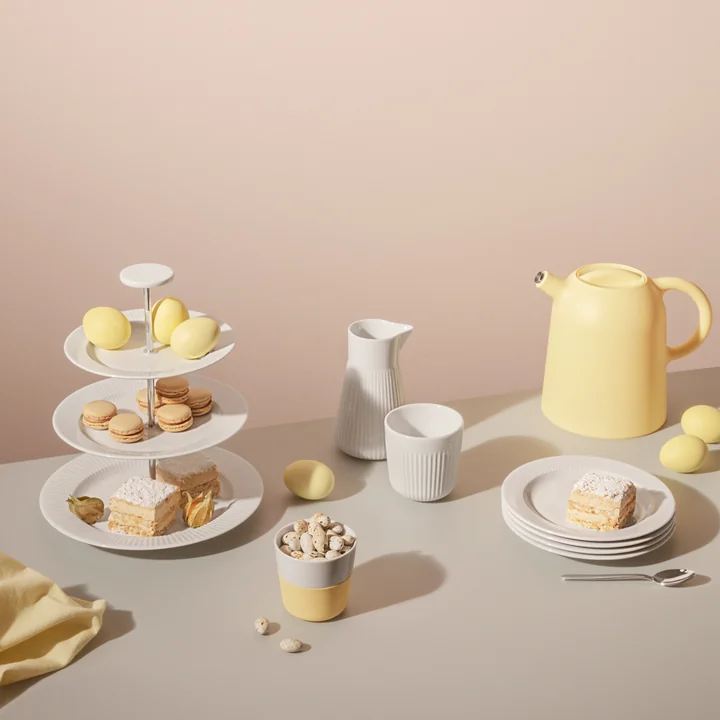 Die Thimble Isolierkanne und der Caffè Lungo-Becher von Eva Solo im neuen Lemon-Gelb