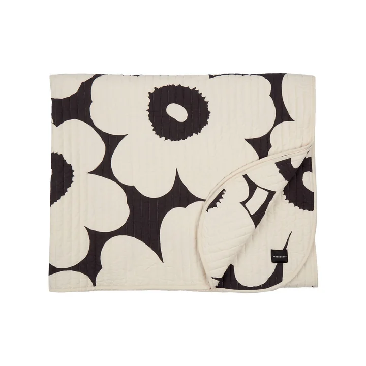 Unikko Tagesdecke von Marimekko in der Ausführung charcoal / off-white