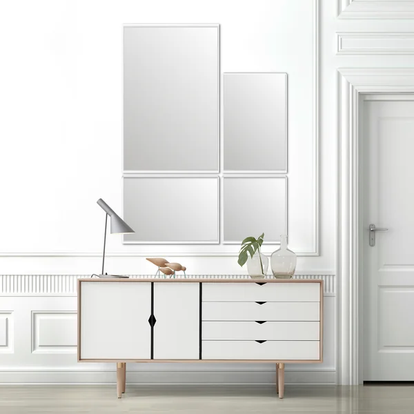 Der VertiMirror Wandspiegel von Verti Copenhagen über einem weißen Sideboard